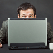 Frightened People Hiding Behind Computer Screen
